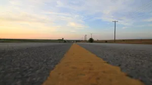 Fast Car Pass on Country Highway