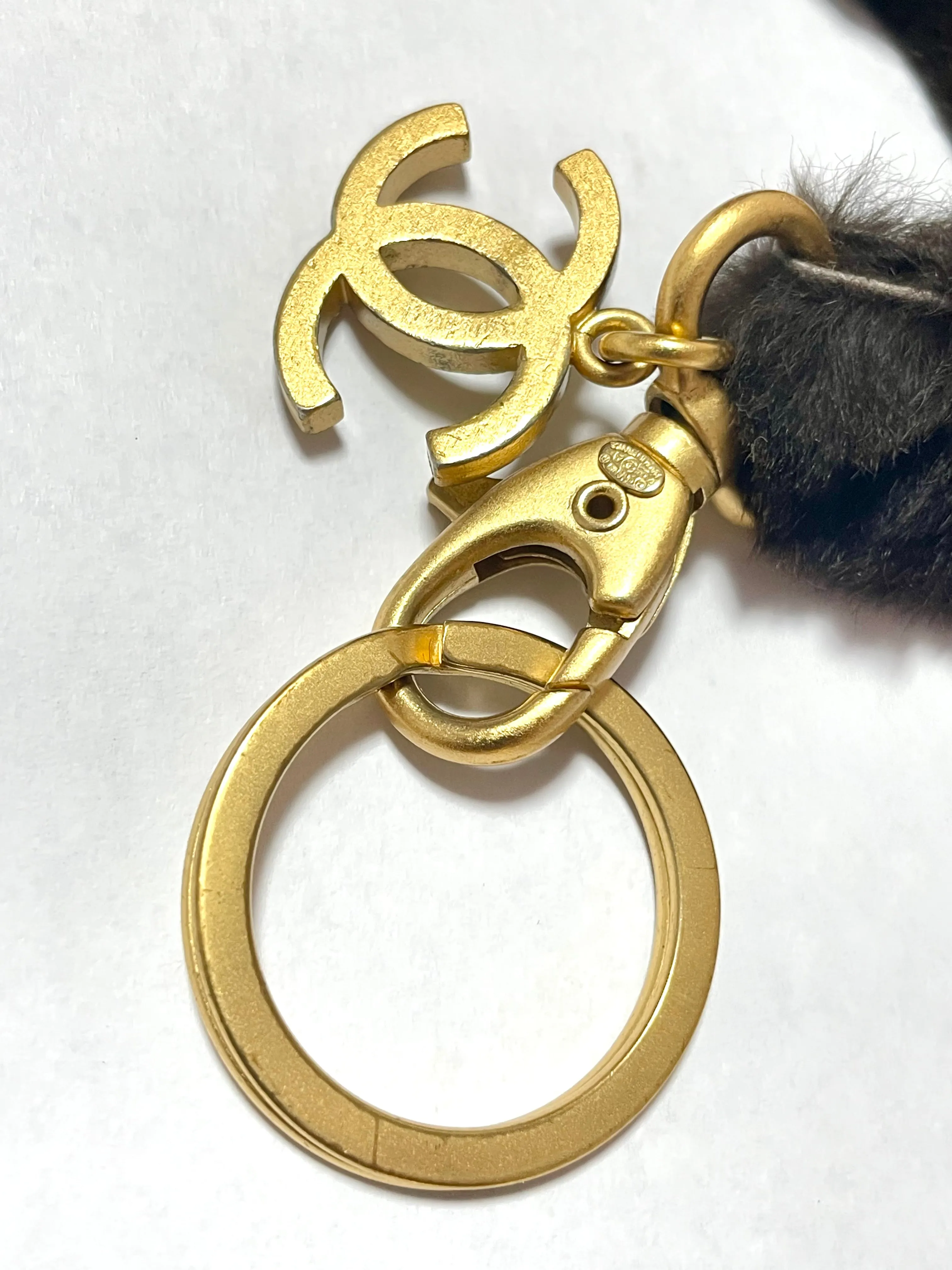 Vintage Chanel brown rabbit fur key strap, keyring with golden CC mark motif. Must have Chanel accessory. Great gift. 070107ac5