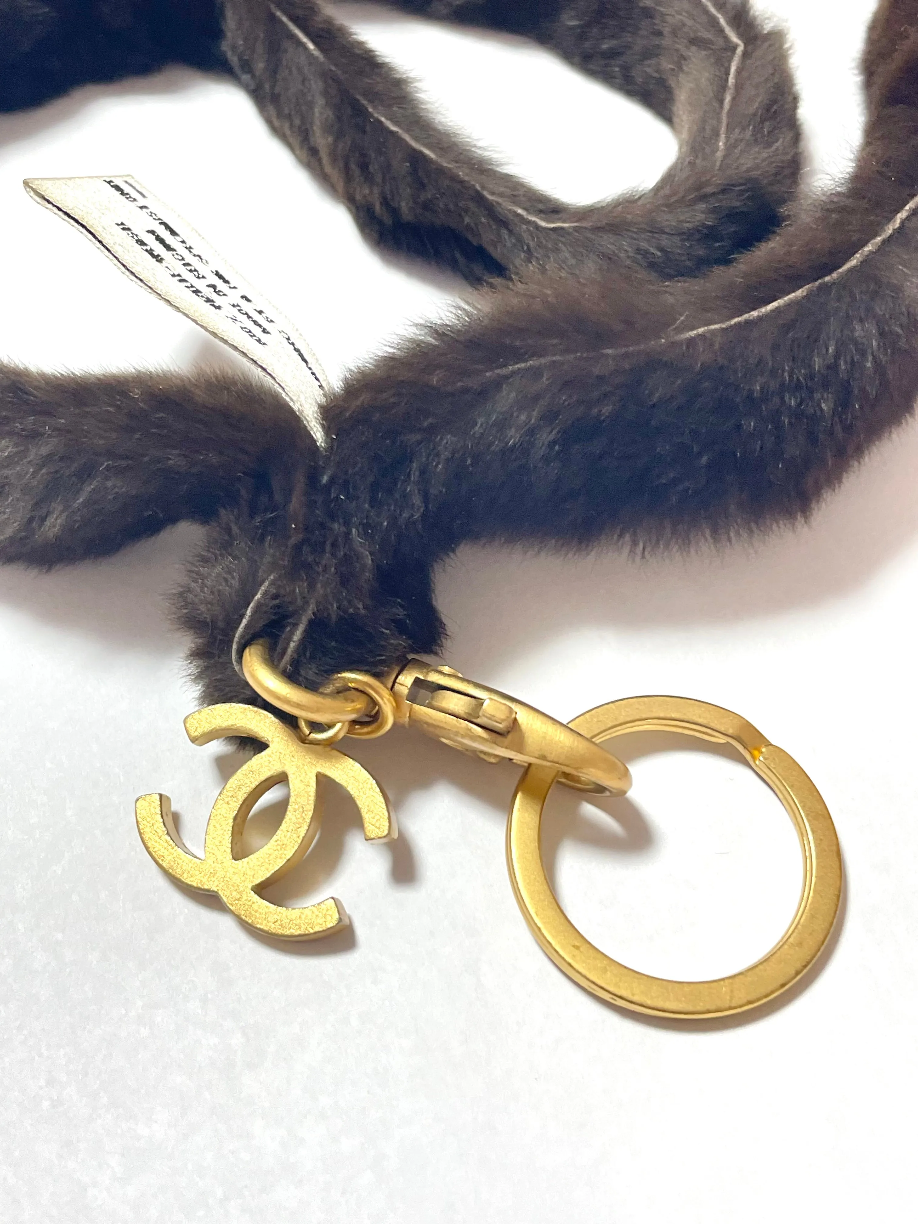Vintage Chanel brown rabbit fur key strap, keyring with golden CC mark motif. Must have Chanel accessory. Great gift. 070107ac5